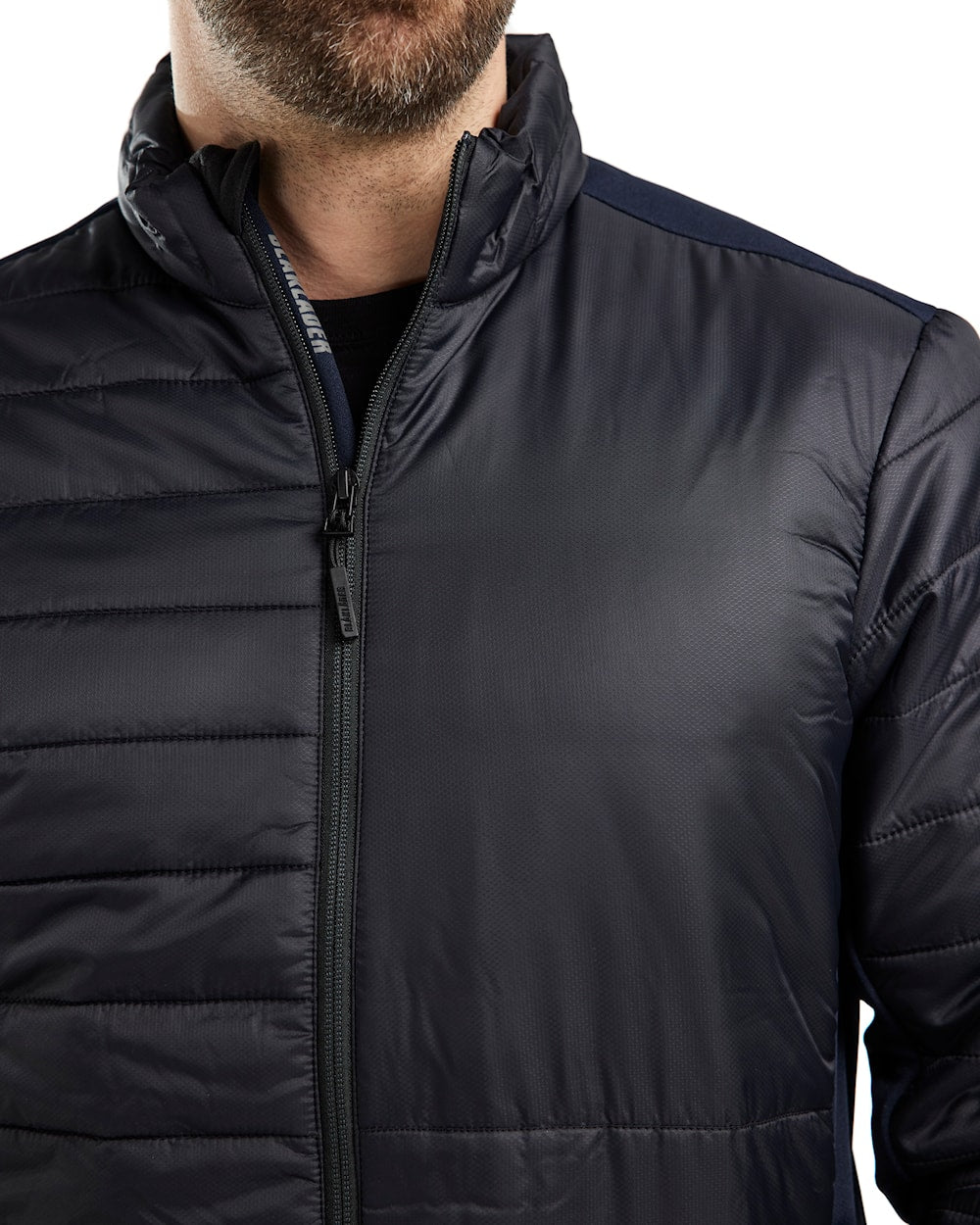 Arbeitsjacke warm gefüttert Herren, Schwarz-Dunkel-Marineblau, Ansicht linke Brust mit Platz für Logo